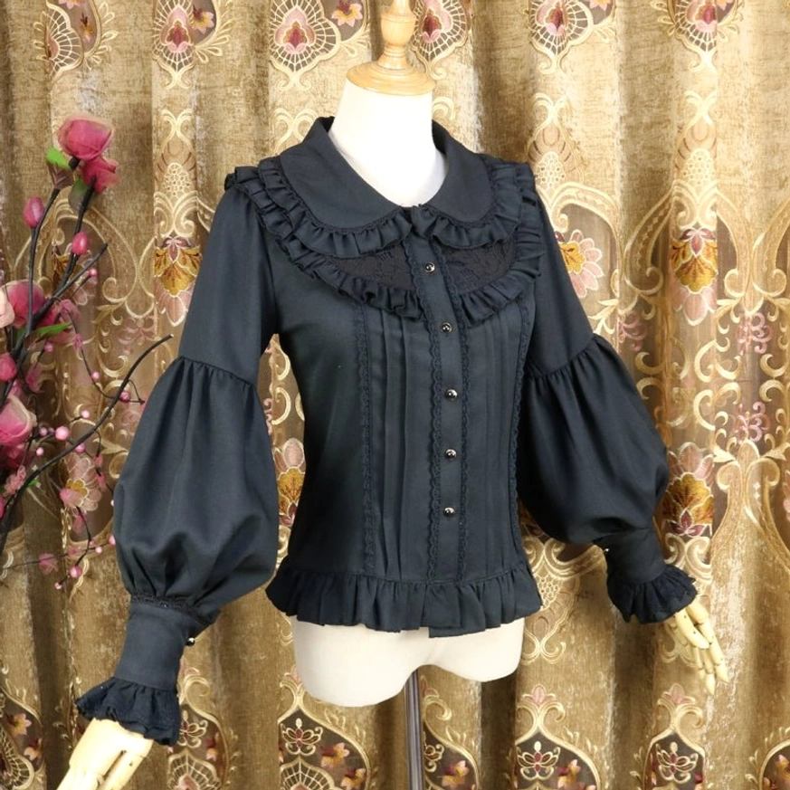 Black classic Lolita Peter Pan collar blouse with dark decorative buttons, ruffled collar and fitted pleated silhouette, front full view