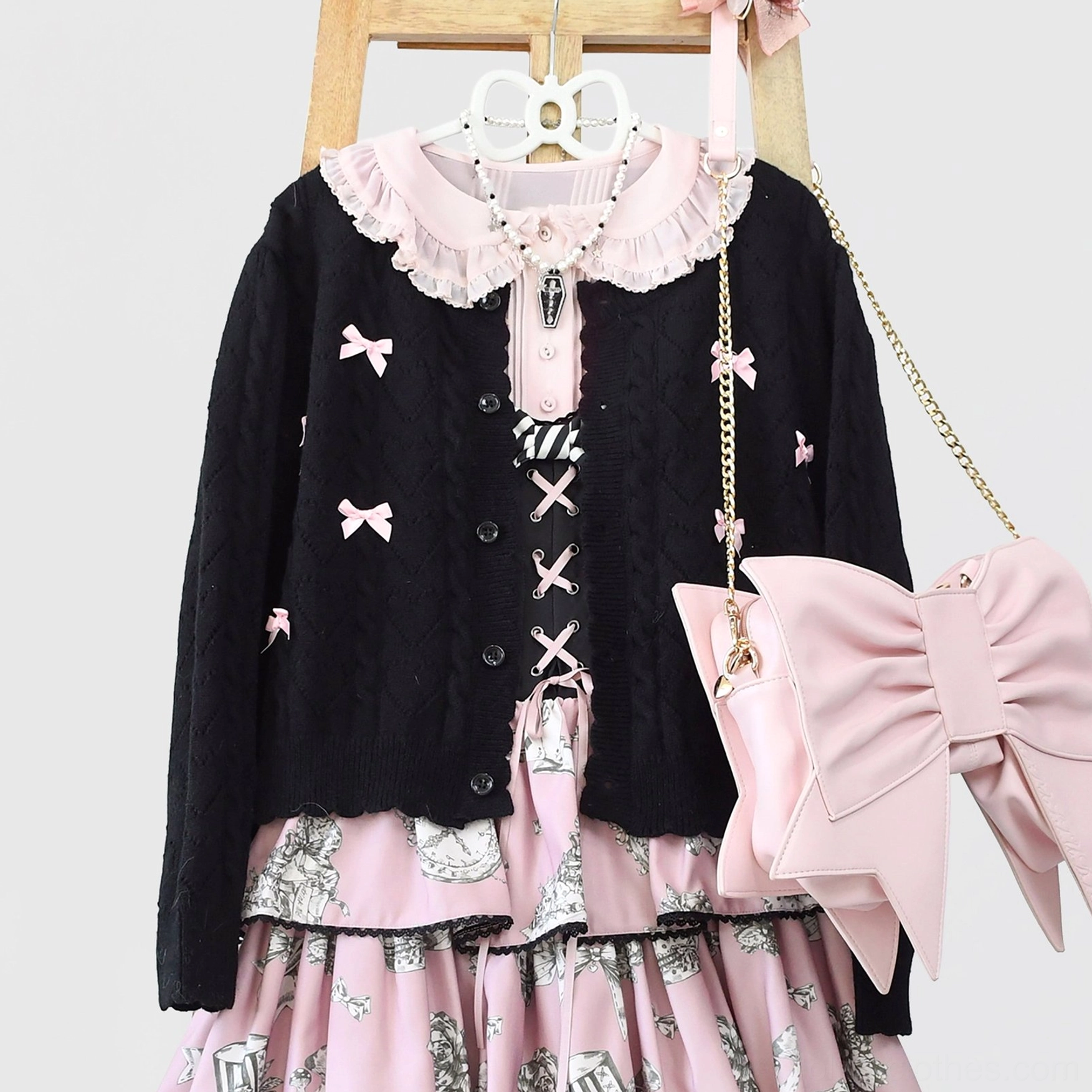 Black-pink hollow out long sleeve Lolita cardigan worn as complete sweet Lolita coordinate with multi-tiered dress, color swatch display