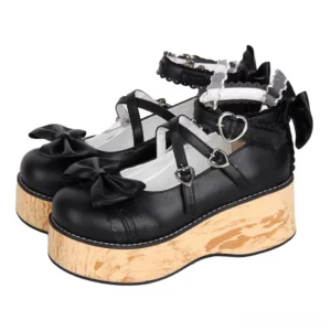 Black Princess Lolita platform shoes with heart-shaped metal buckles, round toe, lace-trimmed ankle straps, and wood grain textured sole, displayed from three-quarter top view