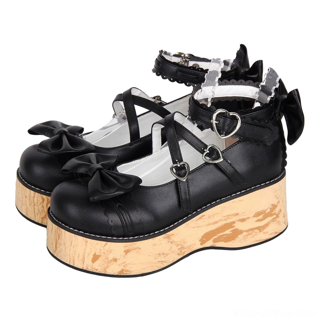 Black Princess Lolita platform shoes with heart-shaped metal buckles, round toe, lace-trimmed ankle straps, and wood grain textured sole, displayed from three-quarter top view