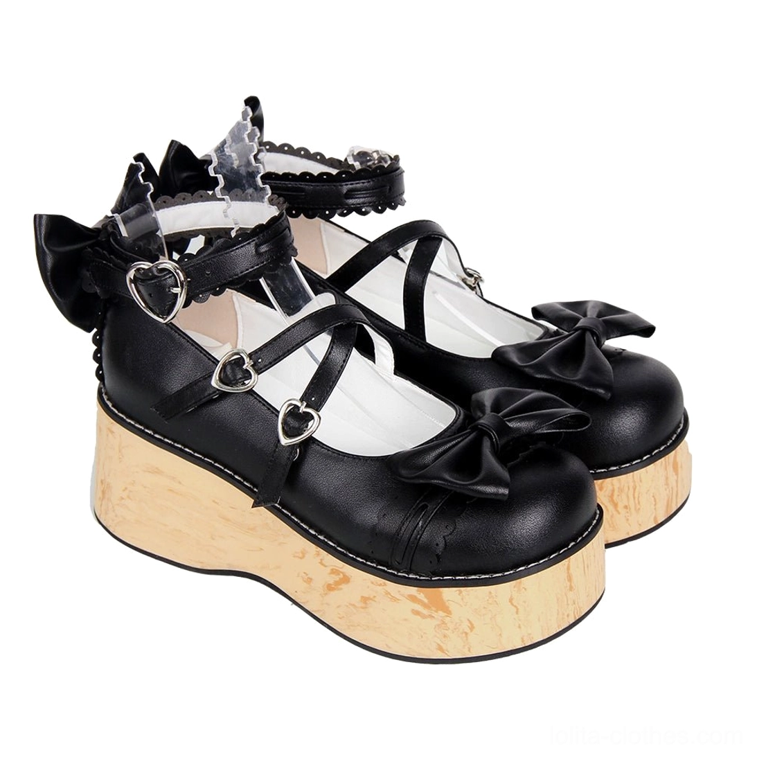 Black Princess Lolita platform shoes rear view showing back bow decoration, heart-shaped buckles, lace-trimmed straps, and textured wood grain sole detail