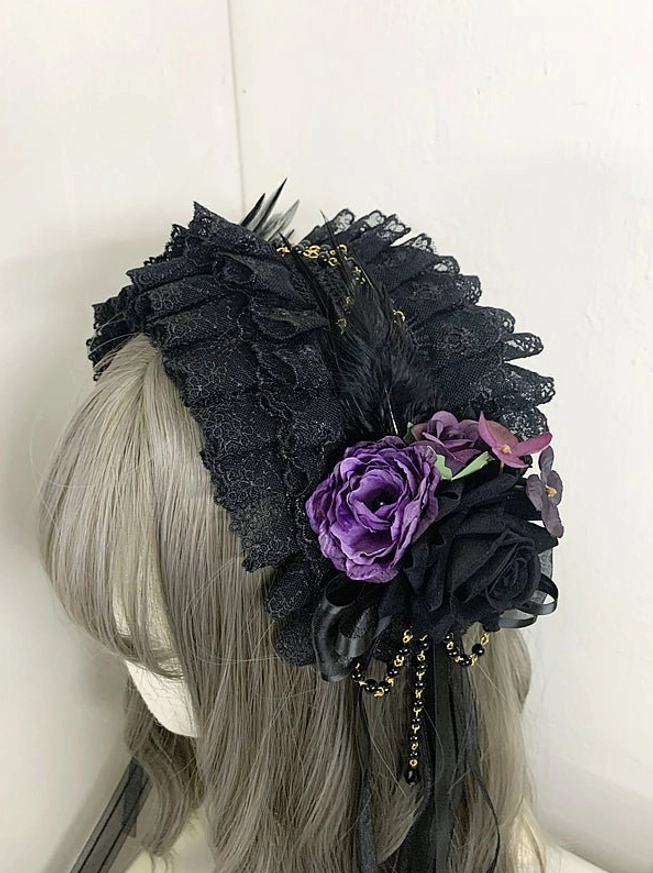 Black and purple gothic lolita lace headdress with purple black silk roses ruffled lace feather trims beaded ribbon tassels front side view