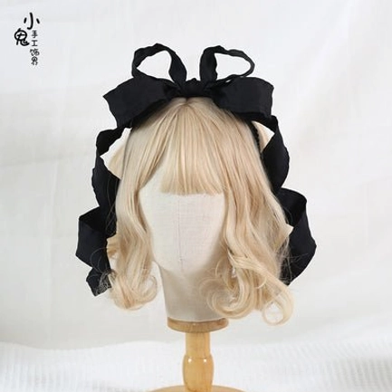 Black solid satin bowknot Lolita hair clip with curved ribbon tails elegant dark gothic Lolita style headpiece