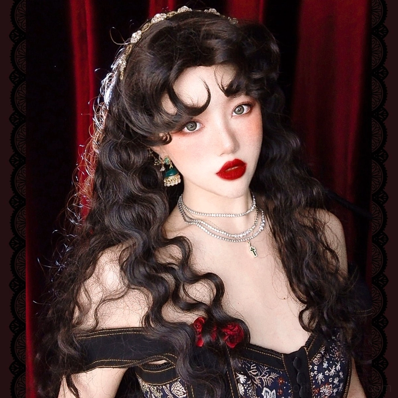 Black sheep curl Lolita wig worn by female model in vintage Lolita outfit with pearl hairband and retro jewelry against red velvet curtain background