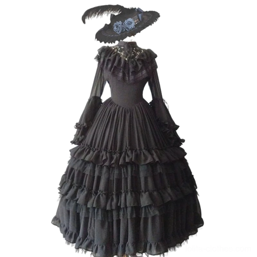 Black Short Style Gothic Wedding Lolita OP Dress with stand collar hime sleeves and layered ruffled hem displayed on mannequin with witch hat accessory