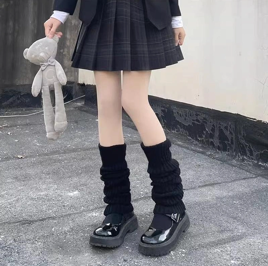 Black slouchy knitted lolita leg warmers front full view legs plaid jk skirt holding teddy rooftop