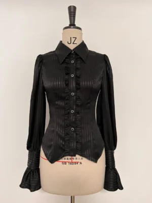 Black striped Ouji Lolita shirt front view with ruffled placket and detachable jabot on dress mannequin, showing vertical satin fabric and tailored silhouette