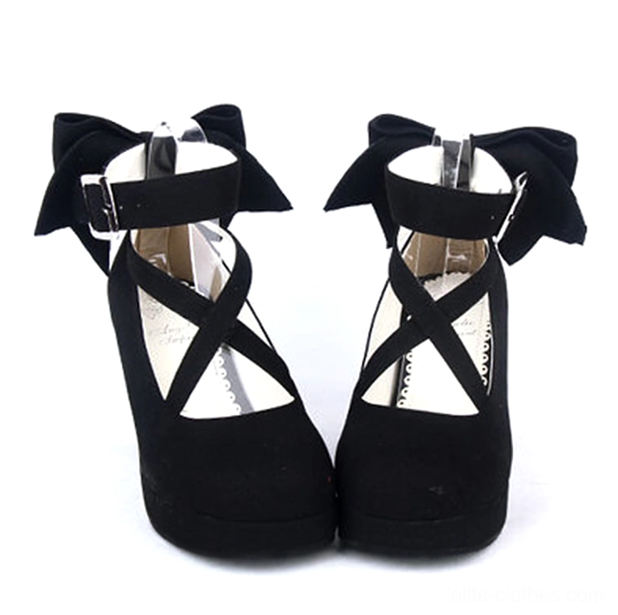 Black suede Lolita platform high heel shoes with rich matte finish, crossover ankle buckle straps, small back bow detail, round toe, and sturdy block heel - detailed side and top view