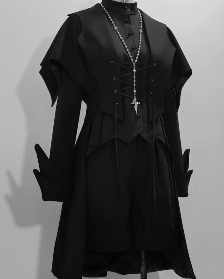 Black swallowtail Ouji Lolita long vest worn for convention and event styling demonstrating real-world alternative fashion photography in cosplay and community settings
