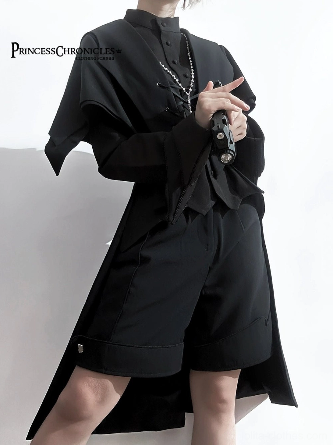 Black swallowtail Ouji Lolita long vest size and fit demonstration across different sizing options showing versatile silhouette for various body types in formal alternative wear