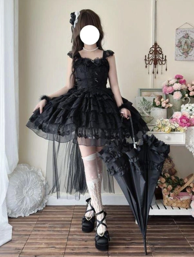 Black sweet lolita JSK with detachable floor-length tulle train, ruffled sweetheart neckline, and layered tiered skirt, back full-body view with parasol