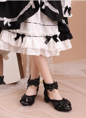 Black Sweet Lolita Mary Jane shoes with star charm bow and cross buckle straps on model, styled with black-white maid lolita skirt