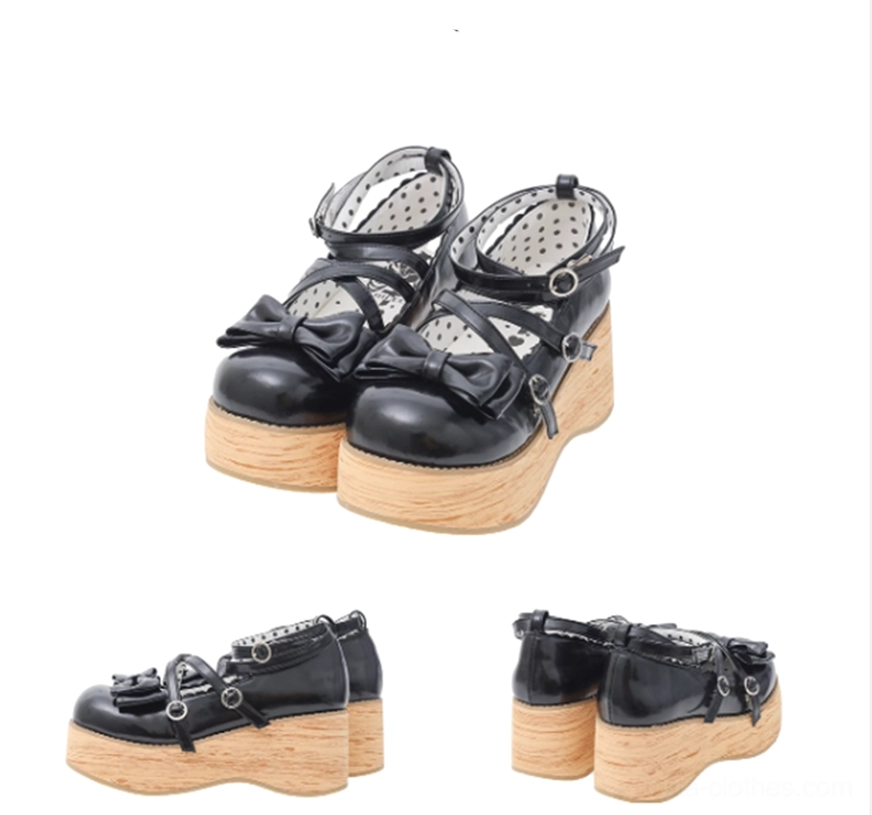 Black patent leather sweet lolita platform Mary Jane shoes with cross buckle straps bow accents and thick wood textured platform sole multiple perspectives