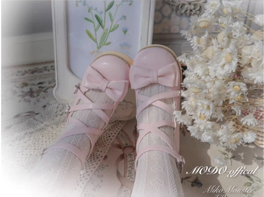 Black sweet lolita platform Mary Jane shoes worn with traditional lolita tea party costume