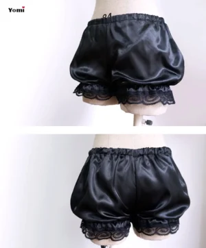 Black sweet lolita puff bloomers with scalloped lace leg cuffs displayed on dress form, front view showing gathered puff silhouette and layered lace trim details in minimalist studio setting for authentic lolita coord reference