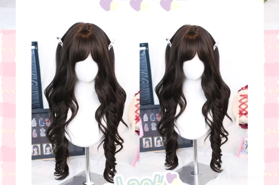 Dual display of dark brown black tea long curly Lolita wigs on two mannequin heads showing thick voluminous waves air bangs side clips