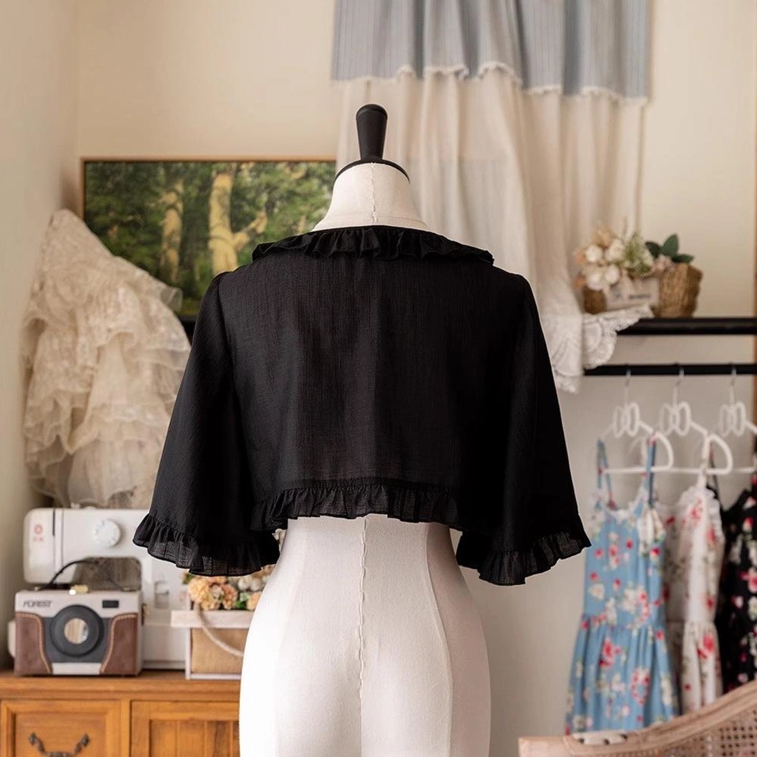 Premium Tencel ruffled cropped cardigan in black, detailed view of high-quality construction, ruffled details, and breathable fabric perfect for summer Lolita wearing and styling