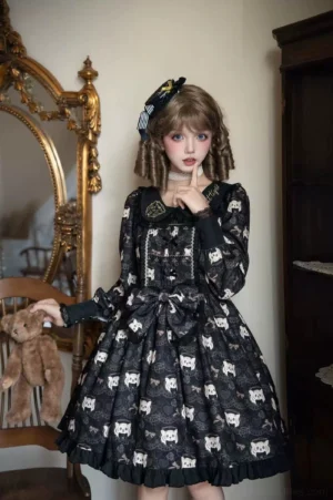 Black tiger print sweet lolita OP dress front view with Peter Pan embroidered collar scalloped neckline and ruffled skirt hem worn by model with vintage vanity mirror backdrop