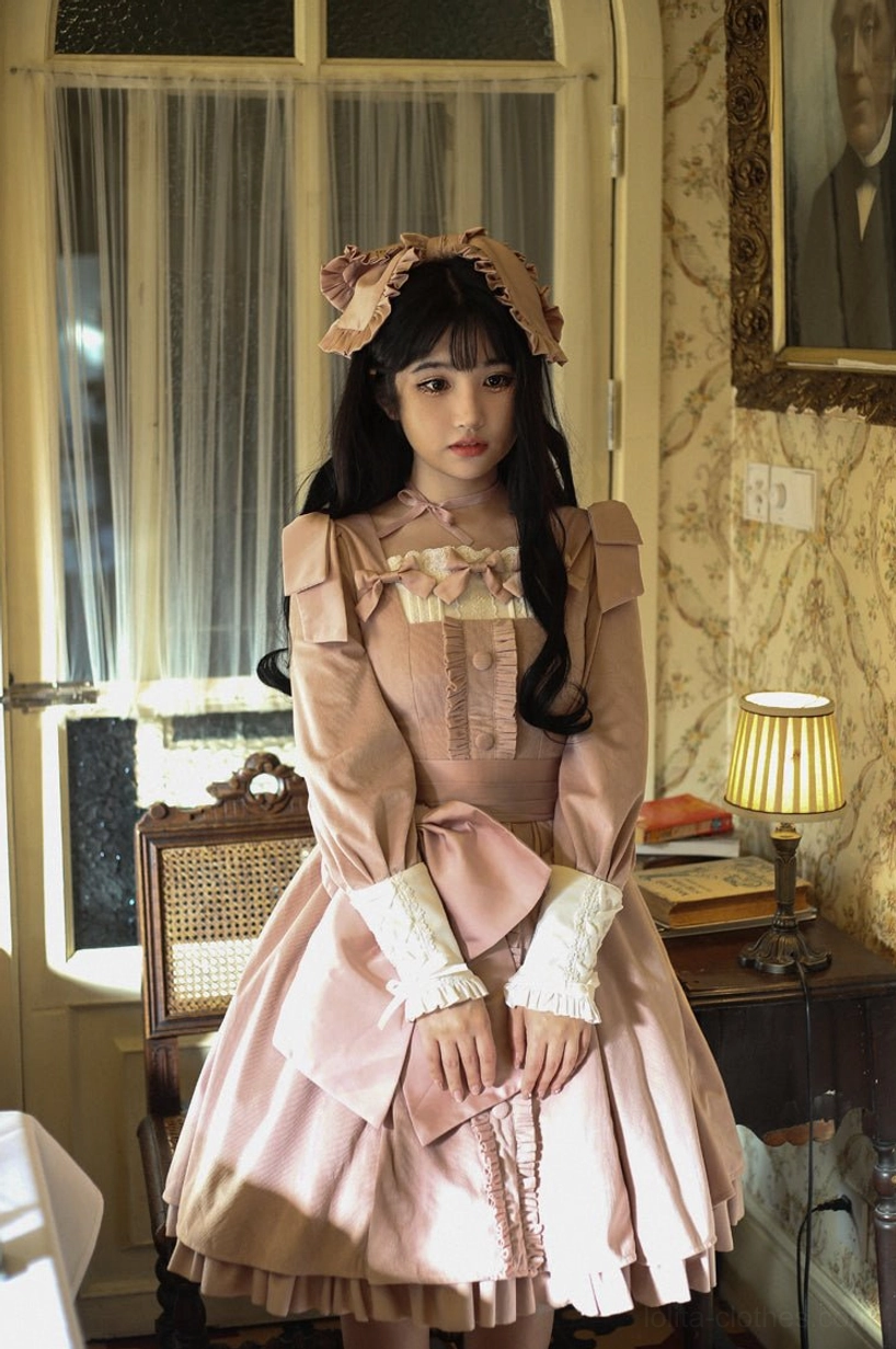 Black velvet Lolita OP dress paired with recommended Lolita fashion accessories including over-the-knee socks, platform Mary Jane shoes, and coordinated structured headpiece complete outfit