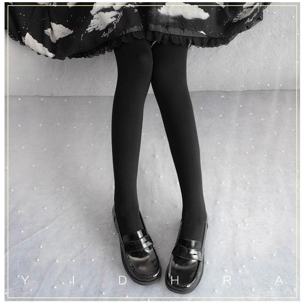 Black solid velvet tights side angle view with black cloud-print Lolita skirt and leather shoes - professional styling