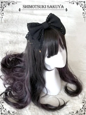 Black vintage Lolita bow KC headdress with delicate star hanging pendants displayed on mannequin with purple-brown curled wig