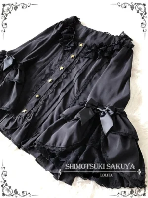 Black vintage lolita long-sleeve blouse flat lay ruffled collar gold star buttons lace trim