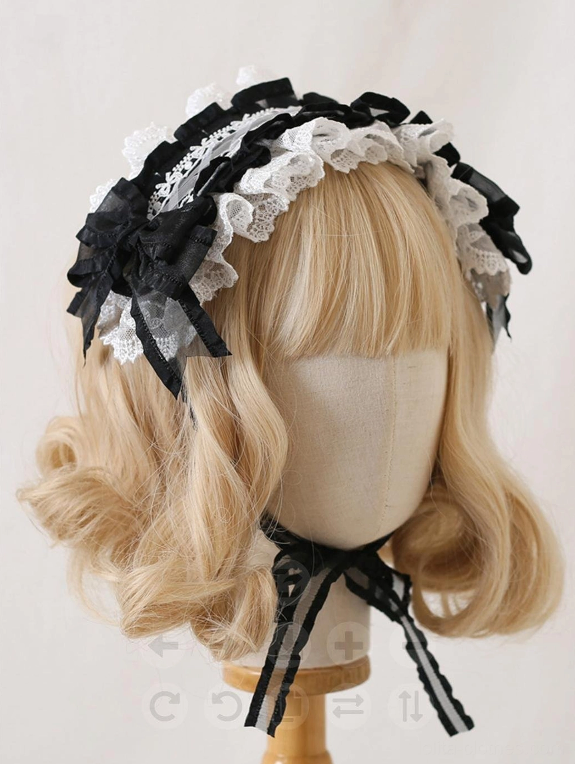 Black and white contrast lolita lace hair clip headband with black mesh bow decoration and matching ribbon pendant, front side view