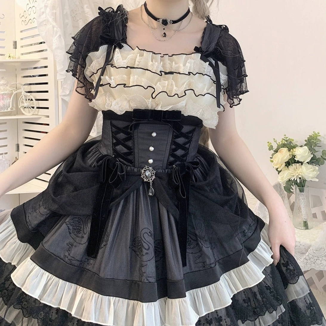 Black and white Gothic Lolita blouse with ruffled square neckline and corset waist, front close-up model shot