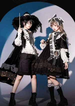 Black and White Sonata couple lolita set double full body front shot featuring ouji vest suit with black shorts and mutton sleeves paired with vintage OP dress with ruffled collar and musical note embroidery