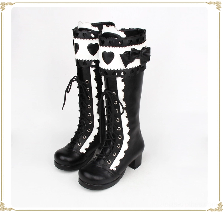 Black and white sweet lolita mid-calf thick heel boots front flat pair view in golden decorative frame complete design showcase