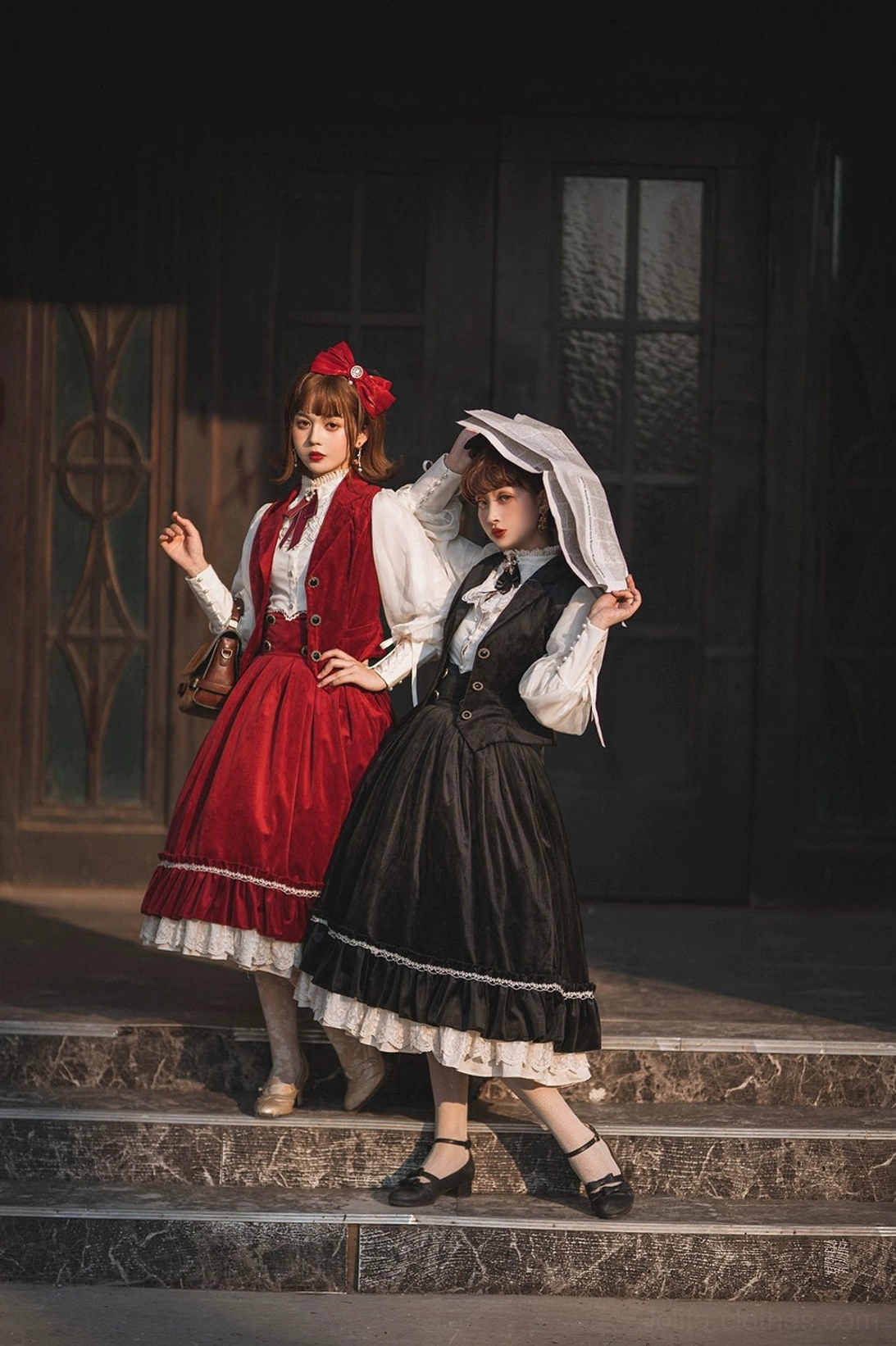 Black and wine red lolita waistcoat dress set with vintage hairstyles on outdoor stone steps