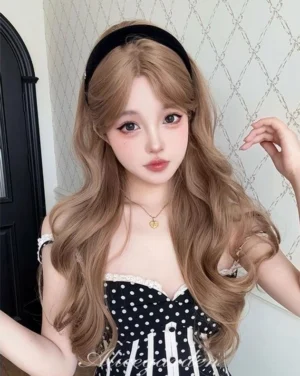 Blonde long wavy lolita wig frontal close-up portrait view on young model with natural caramel blonde loose waves middle-parted soft bangs polka dot camisole black headband