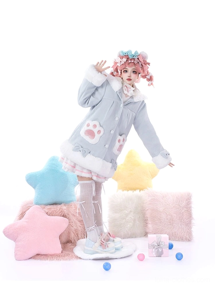 Light blue kawaii lolita plush cat coat with fuzzy white trim and cat paw appliqué details, full-body front view on model with pink curly hair