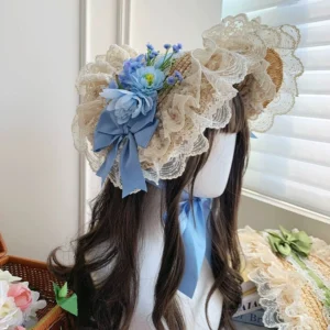 Blue themed country lolita straw bonnet cap with blue satin bow blue gradient flowers and matching neck ribbon on mannequin