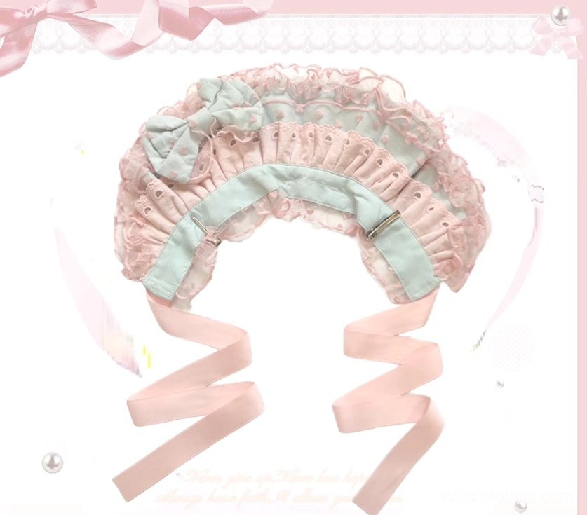 Blue-green vintage Lolita bonnet with lace brim and matching decorative bow accent