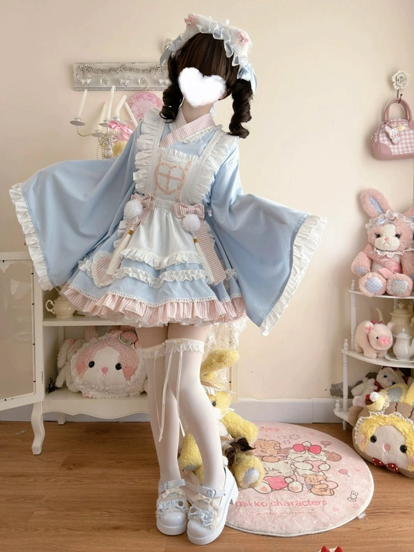 Blue maid-style lolita nurse dress set front full-body standing view with twin curly buns cat ear hairband and white leather loafers