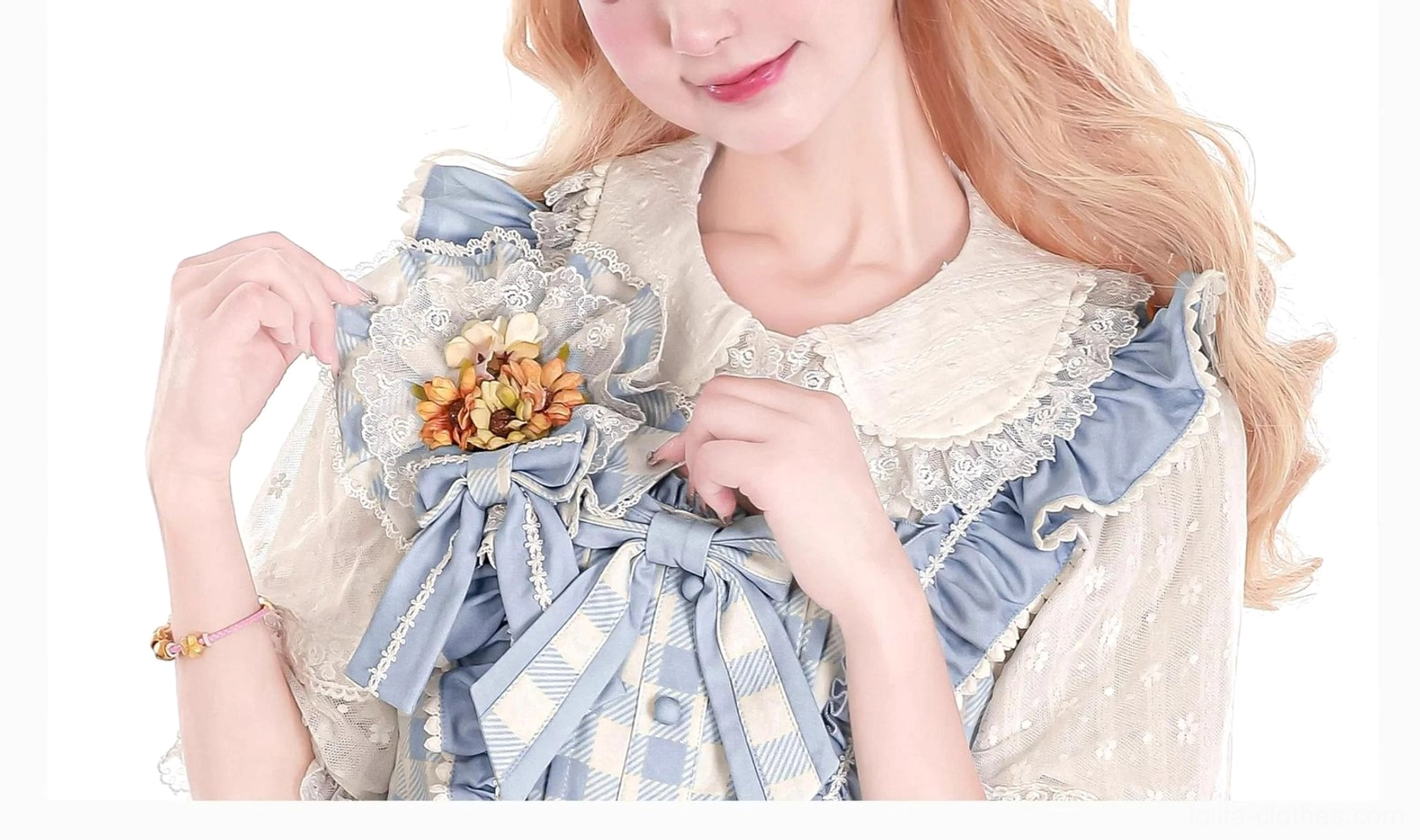 Plaid floral bow lolita brooch with artificial sunflower and satin ribbon worn on blue checkered sweet lolita blouse chest area