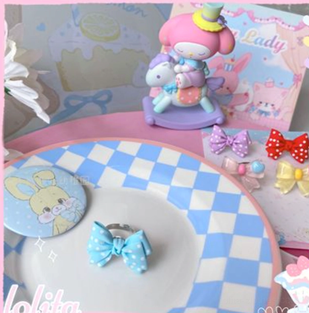 Blue powder sweet lolita bowknot ring ideal for gingham check coordinate styles and pastel lolita fashion aesthetic with adjustable resin band