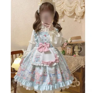 Model wearing pastel blue sheep print sweet lolita jumper skirt dress with matching Peter Pan collar blouse in vintage interior setting