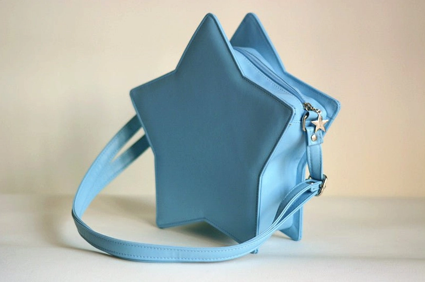 Blue star-shaped Lolita crossbody bag front flat view, Sweet Lolita messenger style with adjustable shoulder strap, handmade five-pointed design