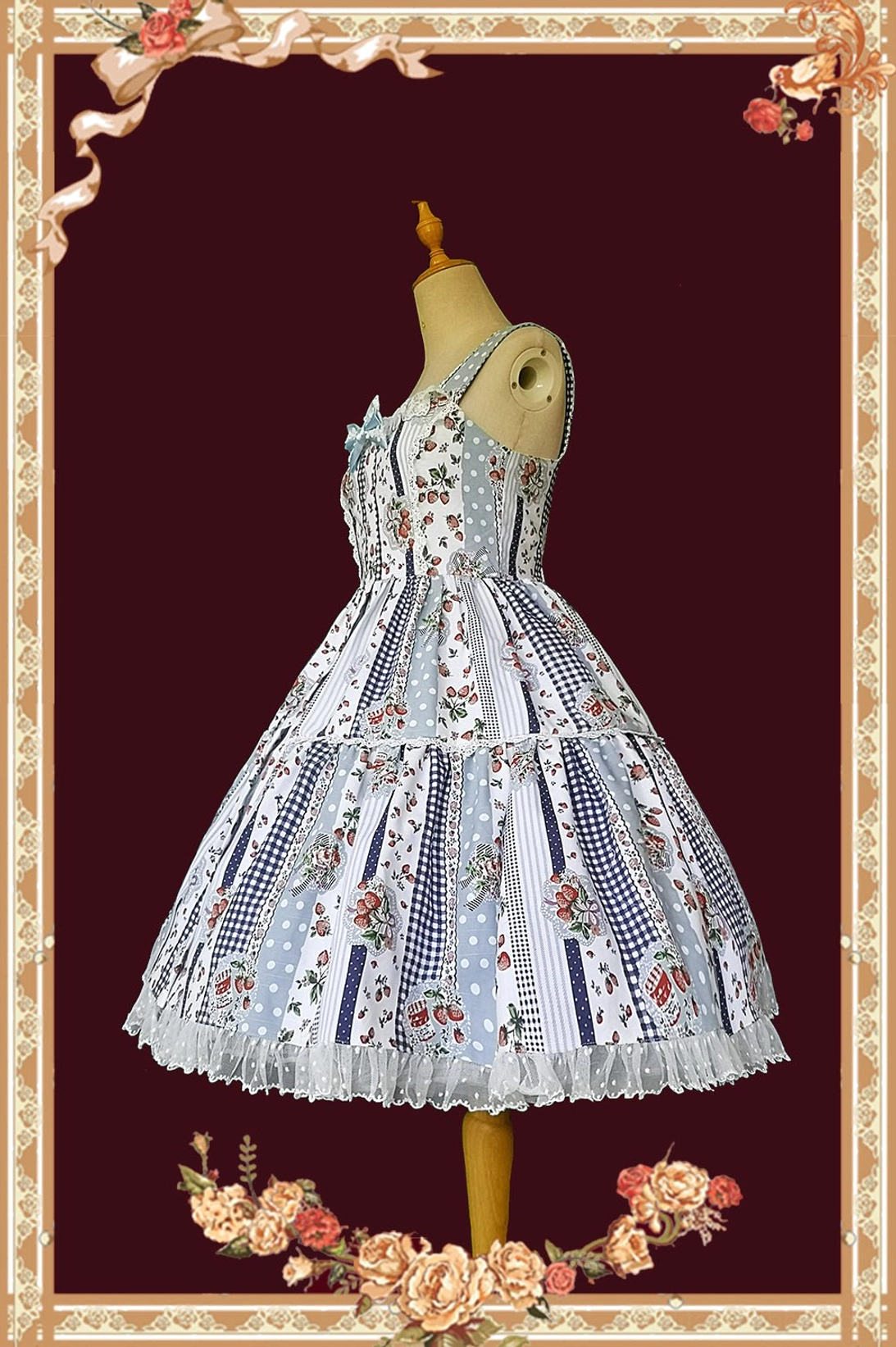 Blue strawberry plaid sleeveless sweet Lolita JSK dress side view, spaghetti straps, A-line patchwork skirt, lace ruffled hem, vintage floral frame background