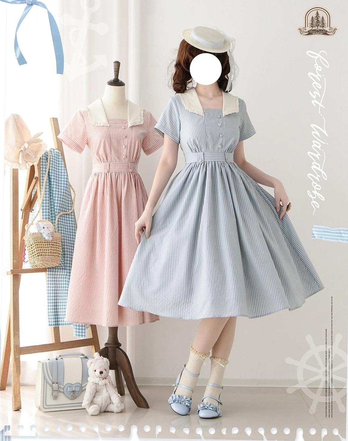 Full front view of display with real model wearing blue striped Lolita OP dress paired with white beret, blue Mary Jane shoes, and nautical vintage accessories