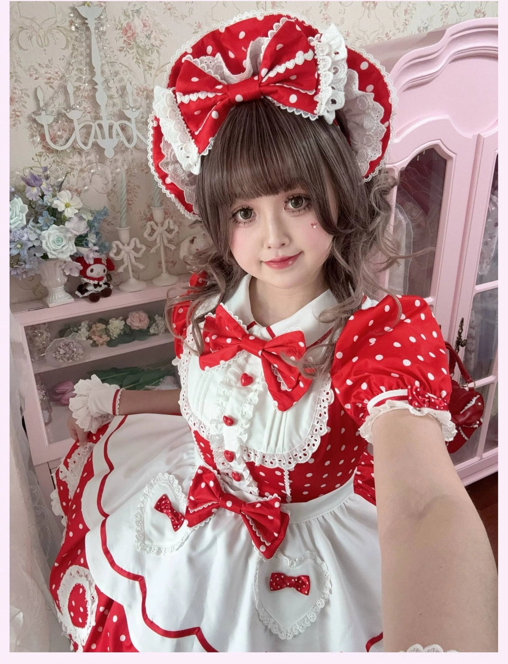 Blue striped lolita OP dress waist and bow detail showing satin bow placement and skirt proportions