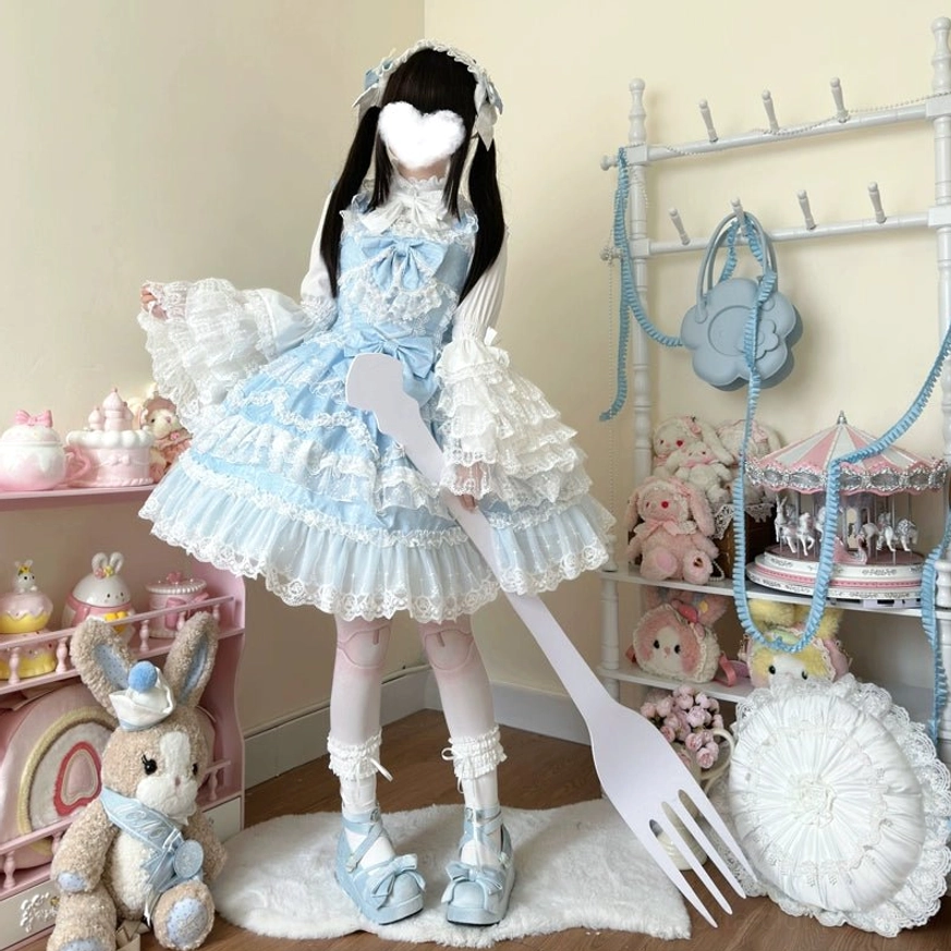 Blue sweet wedding lolita JSK dress full-body front holding giant fork prop showing square neckline lace trim and multiple satin bows