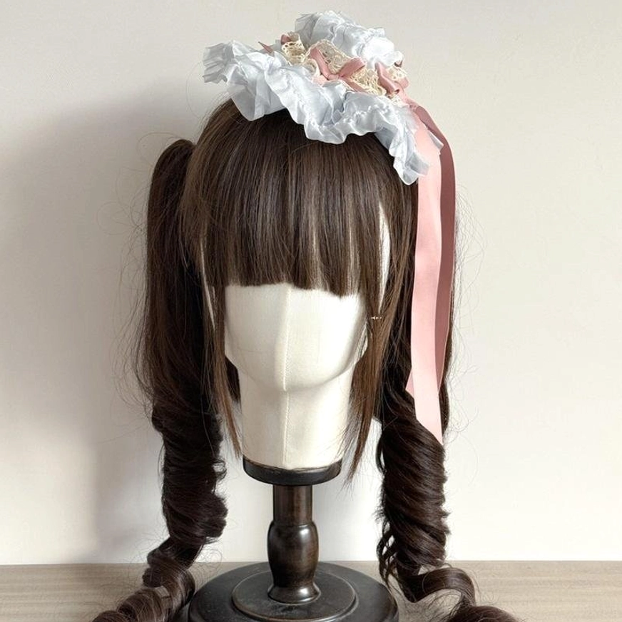 Blue-white floral lace lolita KC head accessory with blue-white lace flowers and pink satin ribbon tail on mannequin