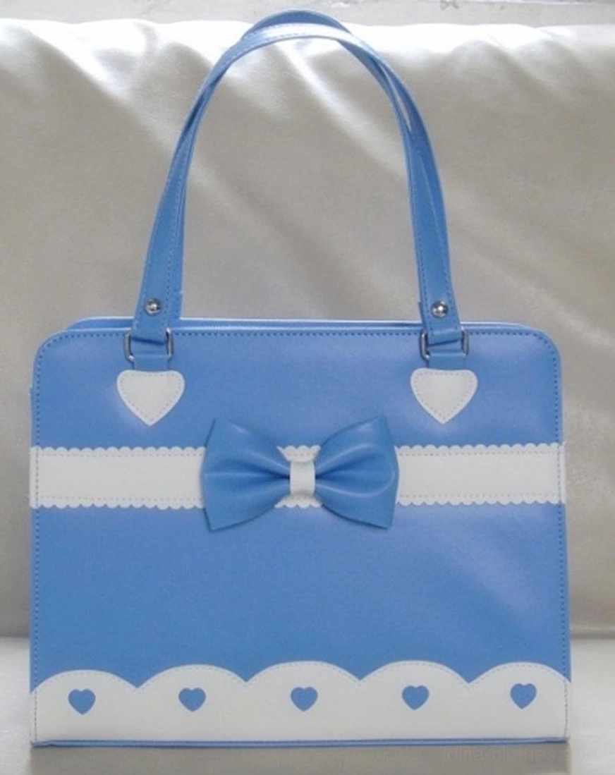Sky blue lolita shoulder bag with matching bow ornament white heart hardware white scalloped trim
