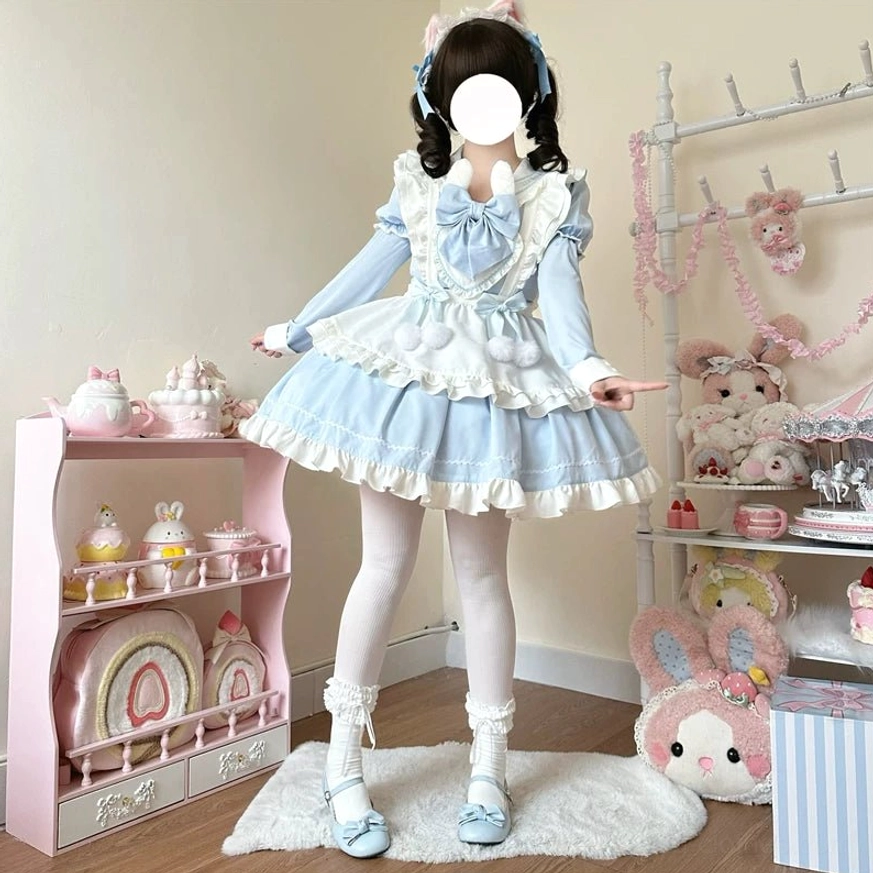 Blue and white maid lolita OP dress model wearing variant with detachable apron, showing full styling with white tights and color-coordinated shoes, sweet aesthetic