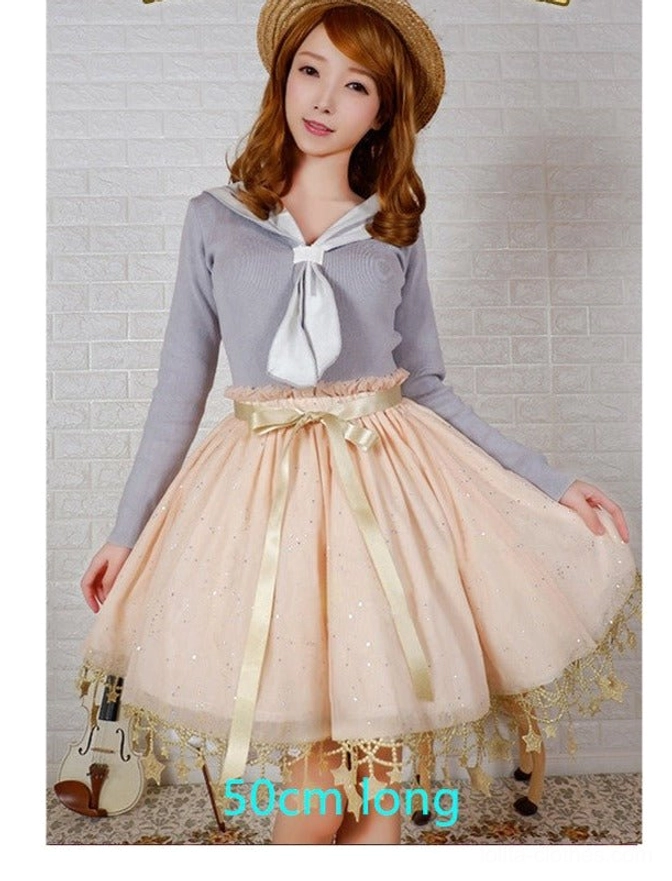 Blush pink sweet lolita petticoat outfit featuring 50cm length with coordinating knit top three-quarter front view
