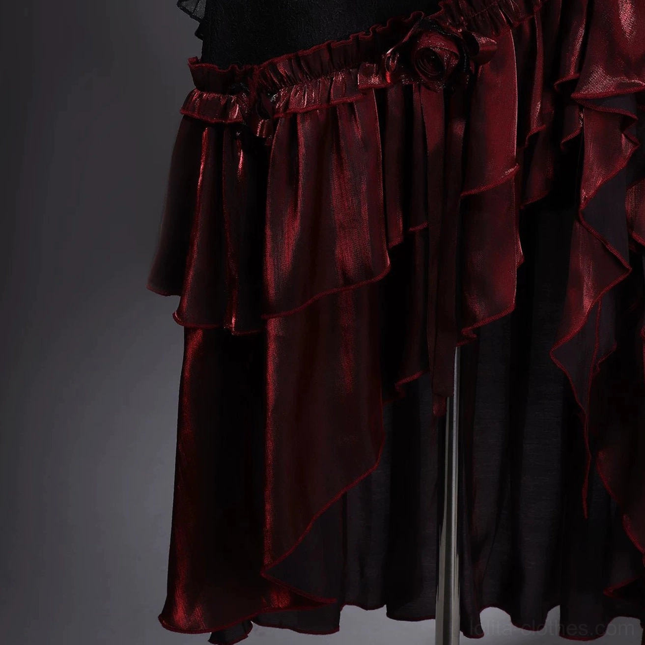Bone Rot Bloom skirt close-up front view shiny wine red layered ruffles asymmetrical uneven hem design