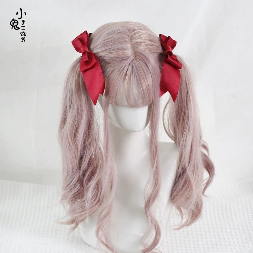 Satin bow hair clips with alligator clip mechanism showing secure attachment system for reliable daily wear